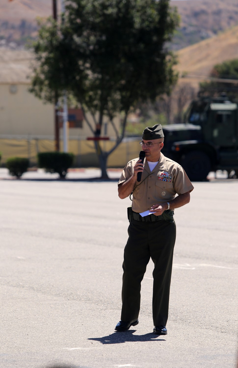 Colonel Christopher A. Tavuchis, commanding officer of 11th Marine Regiment, addresses the audience during a regimental change of command ceremony aboard Marine Corps Base Camp Pendleton, Calif., July 22, 2014. During the ceremony, Tavuchis assumed command of 11th Marines. (U.S. Marine Corps photo by Lance Cpl. David Silvano/released)