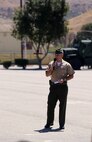 Colonel Christopher A. Tavuchis, commanding officer of 11th Marine Regiment, addresses the audience during a regimental change of command ceremony aboard Marine Corps Base Camp Pendleton, Calif., July 22, 2014. During the ceremony, Tavuchis assumed command of 11th Marines. (U.S. Marine Corps photo by Lance Cpl. David Silvano/released)