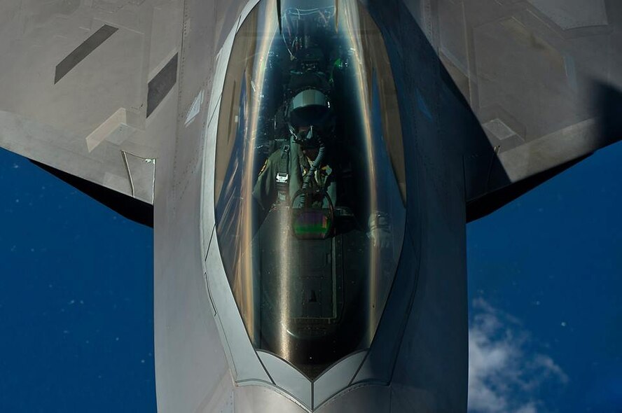A U.S. Air Force F-22 Raptor from the 199th Fighter Wing refuels from a KC-135 Stratotanker from the 96th Air Refueling Wing, during the Rim of the Pacific exercise July 18, 2014, over Hawaii. Twenty-two nations, more than 40 ships, six submarines, and more than 200 aircraft and 25,000 personnel will participate in the biennial Rim of the Pacific (RIMPAC) exercise 2014 scheduled June 26 to Aug. 1, in and around the Hawaiian Islands and Southern California. The world's largest international maritime exercise, RIMPAC provides a unique training opportunity that helps participants foster and sustain cooperative relationships that are critical to ensuring the safety of sea lanes and security on the world's oceans. RIMPAC 2014 is the 24th exercise in the series that began in 1971. (U.S.