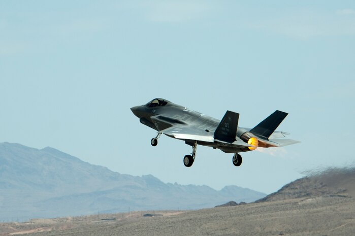 An F-35A Lightning II, assigned to 59th Test and Evaluation Squadron, takes flight July 18, 2014, at Nellis Air Force Base, Nev. The F-35 Lightning II joint strike fighters at Nellis returned to flight July 18 after a runway fire taking place June 23 at Eglin Air Force Base, Fla., resulted in the fleet being grounded. (U.S. Air Force photo by Senior Airman Timothy Young)