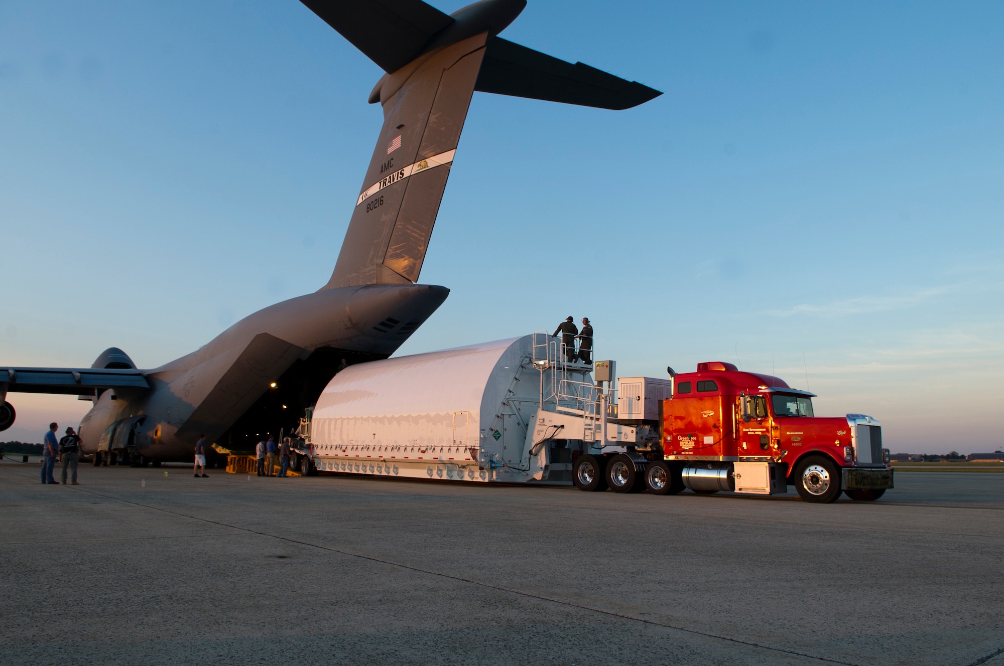 After several hours of effort, the Pathfinder is on the ramp at Joint Base Andrews, Md., July 17, 2014.  The cargo was then delivered to Goddard Space Flight Center in Greenbelt, Md., by tractor trailer. (U.S. Air Force photo/Staff Sgt. Torey Griffith)