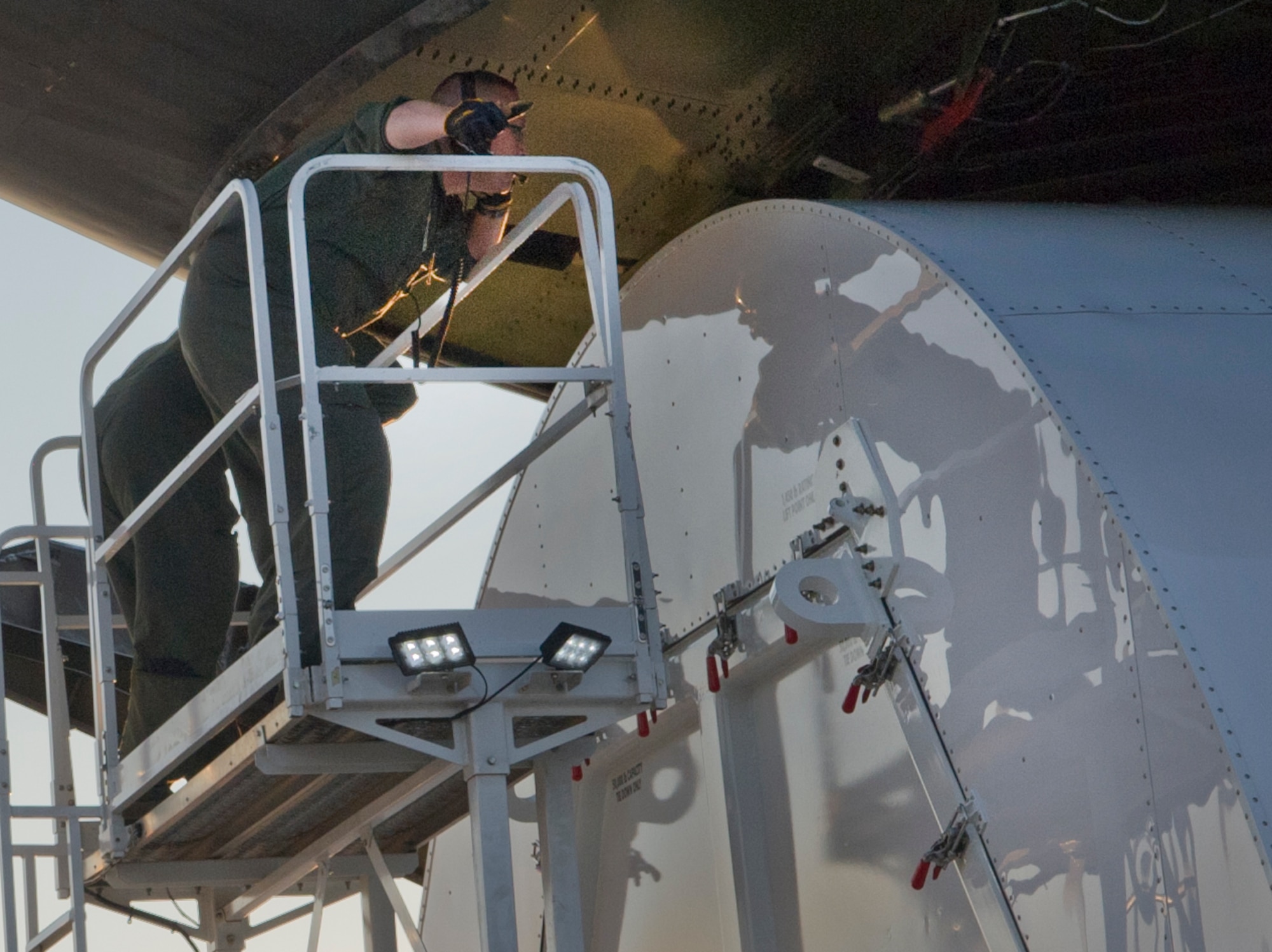 Loadmasters from the 22nd Airlift Squadron monitor the tight clearances between the Pathfinder and the C-5C Galaxy’s rear opening as the cargo inches its way onto the ramp at Joint Base Andrews, Md., July 17, 2014.  The 22nd ALS is from Travis Air Force Base, Calif., and operates the Air Force’s only C-model Galaxies, which are specially modified to carry NASA’s space equipment. (U.S. Air Force photo/Staff Sgt. Torey Griffith)