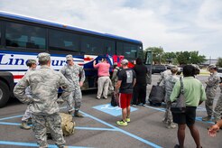 Members of the 628th Civil Engineer Squadron prepare for deployment to Guantanamo Bay, Cuba, July 17, 2014, at Joint Base Charleston, S.C. Members of the 628th CES deployed to Guantanamo Bay for installation support. (U.S. Air Force photo/Senior Airman George Goslin)