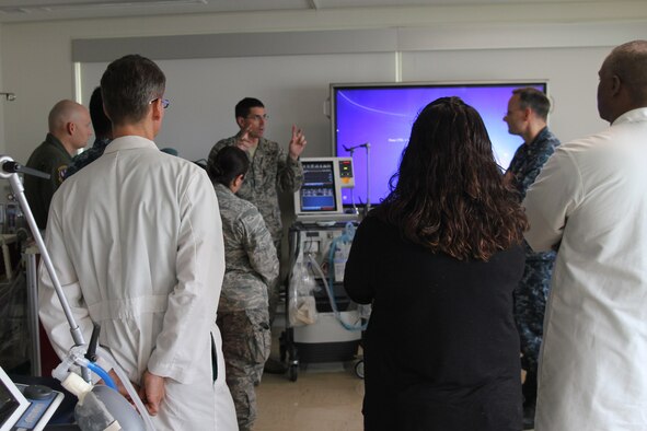 Dr. Daniel Bruzzini, 88th Medical Group, discusses with the students on how to use a mechanical ventilator on children. (Courtesy photo)
