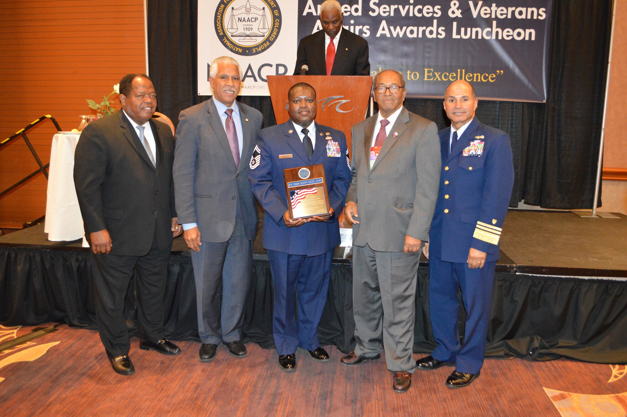 Senior Master Sgt. Torry Thompson of the Nevada Air National Guard receives the Roy Wilkins Renowned Service Award at the 2014 National Association for the Advancement of Colored People (NAACP) 39th Annual Armed Services and Veterans Affairs Awards Luncheon, Las Vegas Nevada July 22, 2014.