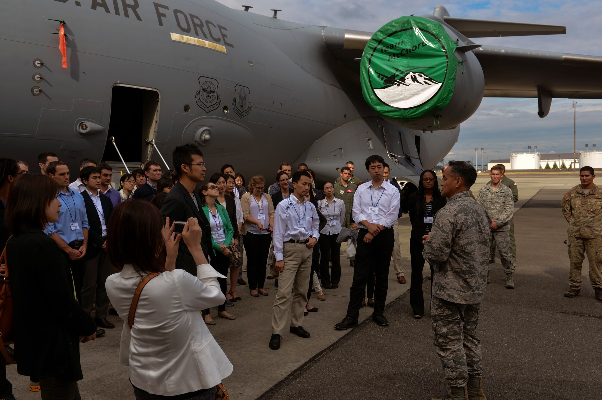 Col. David Kumashiro, 62nd Airlift Wing commander, thanks members of the U.S. Japan Leadership Program July 22, 2014, for embracing the opportunity to learn about the Air Force at Joint Base Lewis-McChord. The USJLP discussed humanitarian assistance and disaster relief operations, including McChord Field’s participation in Operation TOMODACHI in response to the Great East Japan Earthquake of 2011. (U.S. Air Force photo/Staff Sgt. Russ Jackson)