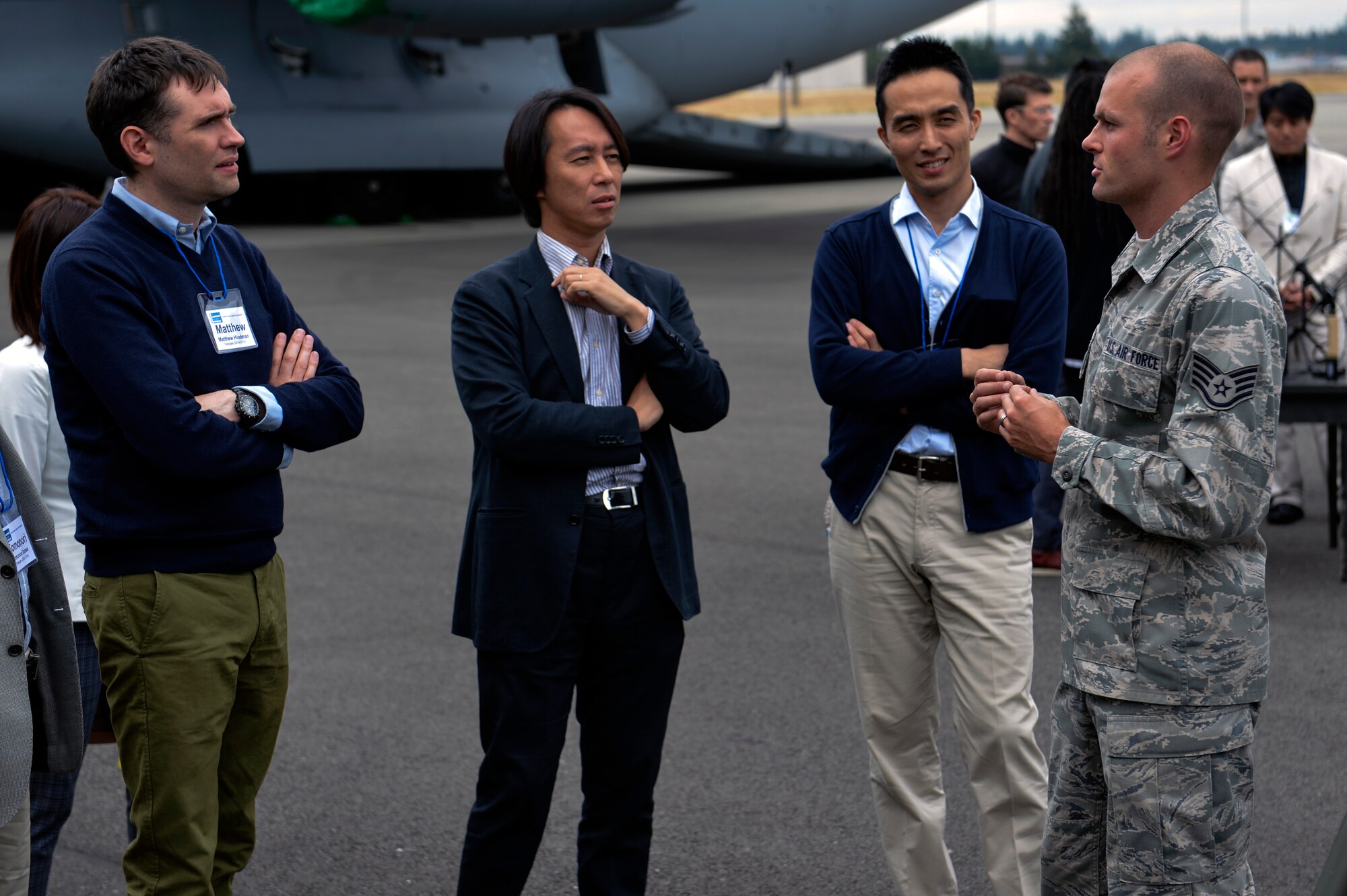 Staff Sgt. David Luken, 1st Weather Squadron weather forecaster, justifies the importance of up-to-the-second weather information on the battlefield July 22, 2014, to members of the U.S. Japan Leadership Program at Joint Base Lewis-McChord. The visit to JBLM strengthened participants understanding and appreciation of U.S. military operations and the role of military relations in the U.S.-Japan alliance. (U.S. Air Force photo/Staff Sgt. Russ Jackson)