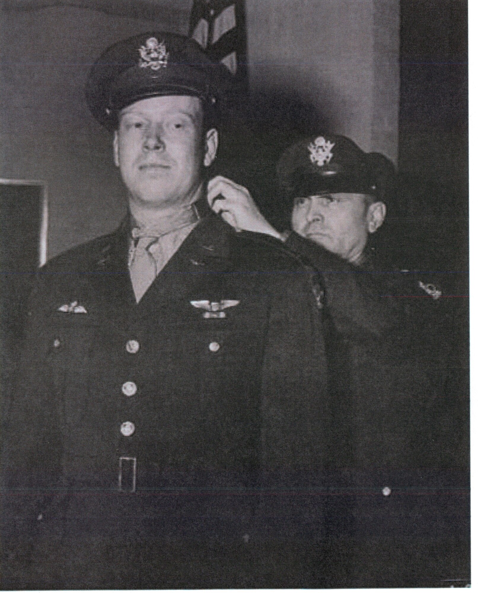 2nd Lt. John C. “Red” Morgan is presented the Medal of Honor by Gen. Ira C. Eaker after returning an unbelievably damaged B-17 Flying Fortress and crew home following a bombing mission with fatal ramifications over Germany during World War II, Dec. 18, 1943. (U.S. Air Force photo)