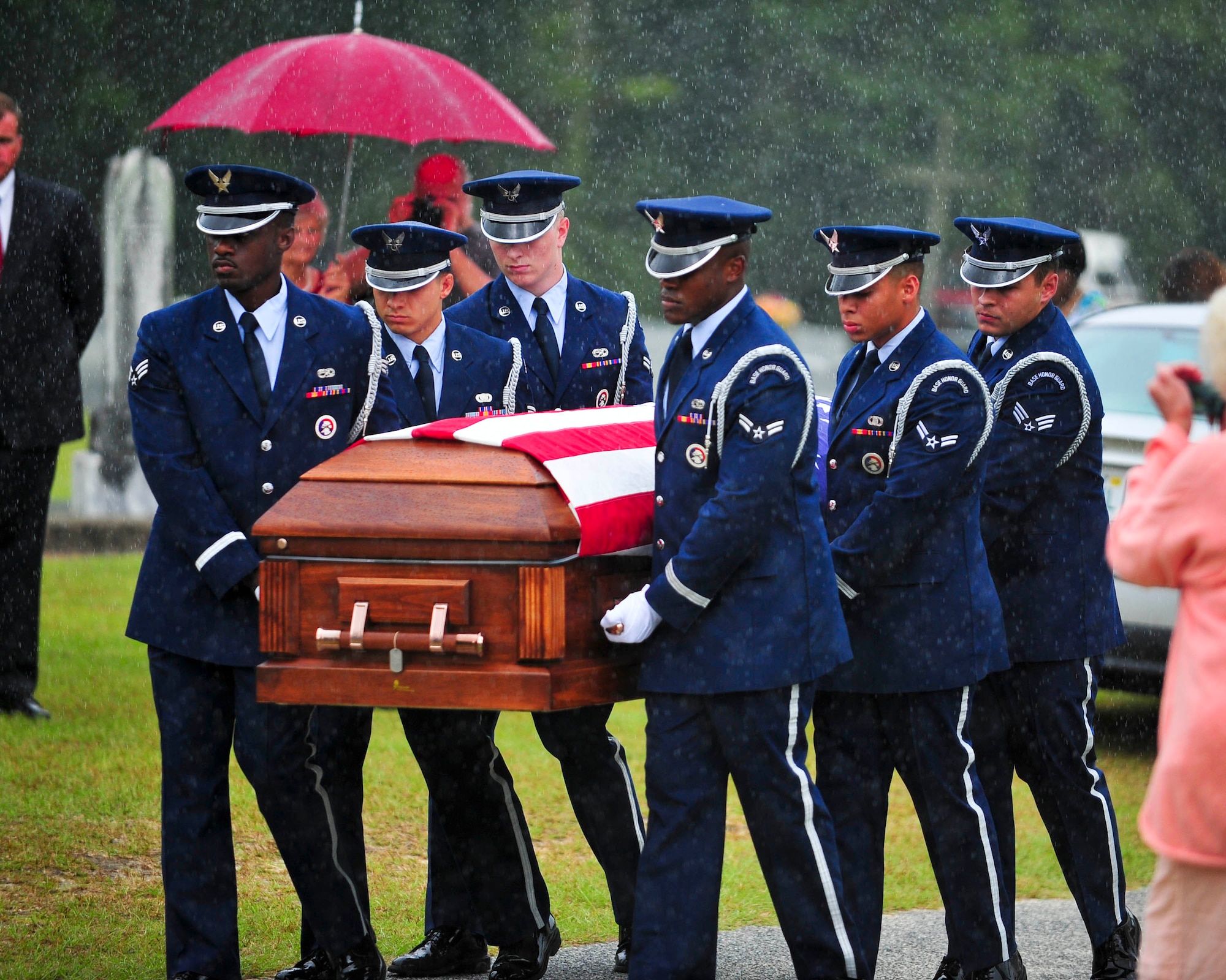 Capt. Robert Turnbull Sr.’s remains are carried by members of the Tyndall base Honor Guard during his funeral July 19. Trunbull was one of 52 service members lost during a C-124 Globemaster crash in Alaska. (U.S. Air Force photo by Airman 1st Class Dustin Mullen)
