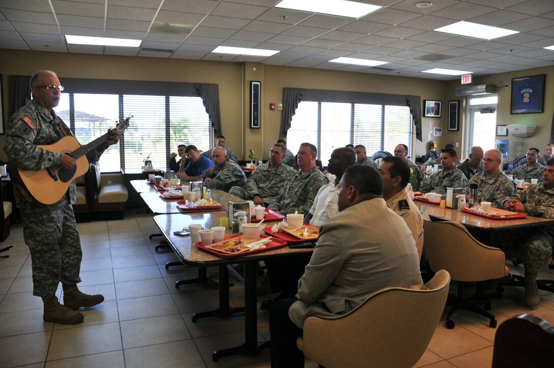 Members of Joint Task Force-Bravo shared a Prayer Breakfast with U.S. Army Col. Michael Lembke, command chaplain, U.S. Southern Command, sponsored by the Joint Task Force-Bravo Chapel, Jul. 17, 2014 at Soto Cano Air Base. Lembke spoke in front of more than 40 Joint Task Force-Bravo Airmen, Soldiers, Sailors, and civilian personnel about the importance of having a strong "root system in order to achieve a high reach". (Photo by Ana Fonseca)