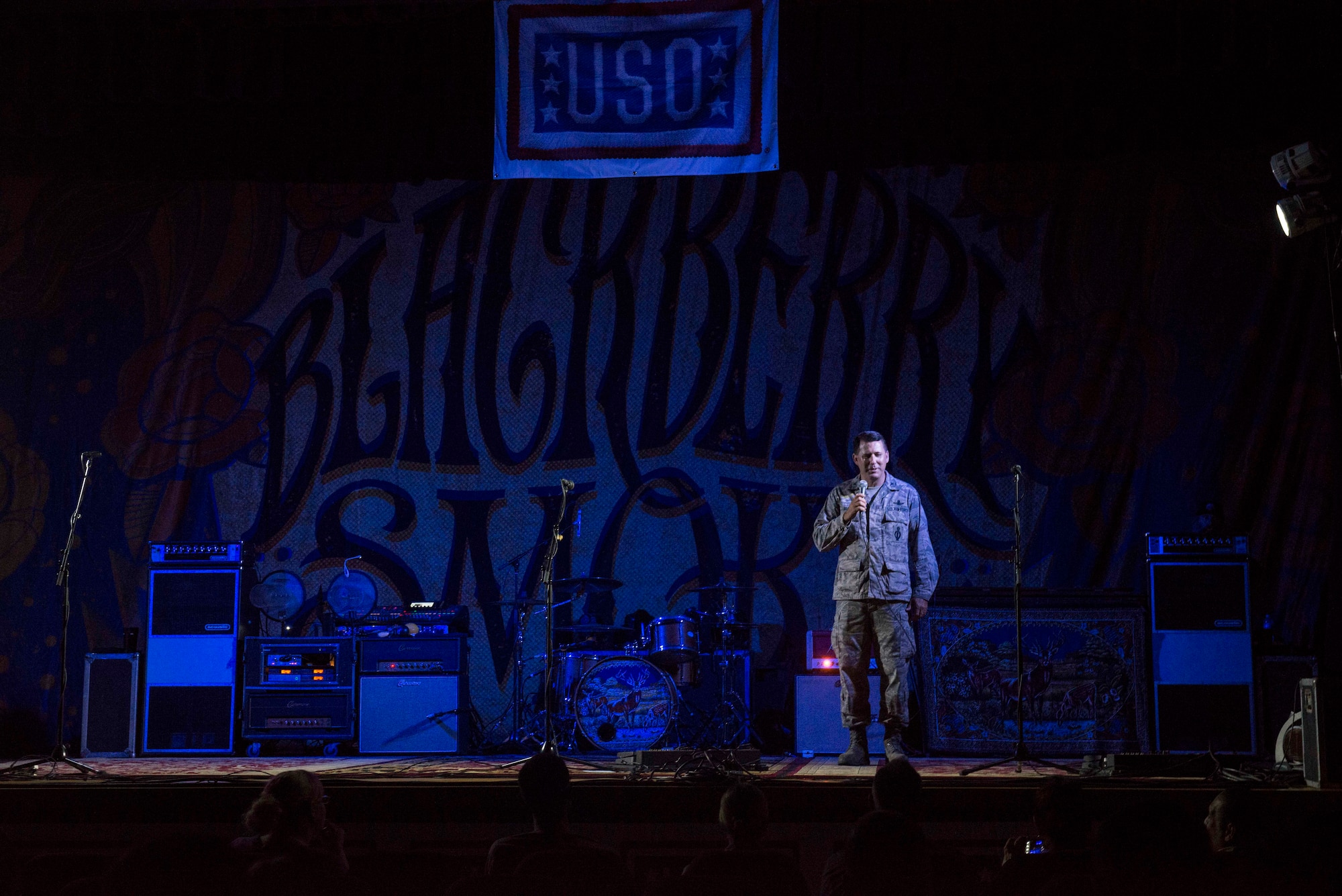 91st Missile Wing vice commander, Thomas Rudy addresses the crowd at the Minot Air Force Base Theater July 21, 2014. The colonel welcomed Blackberry Smoke to Minot during their USO tour. (U.S. Air Force photos/Airman 1st Class Lauren Pitts) 