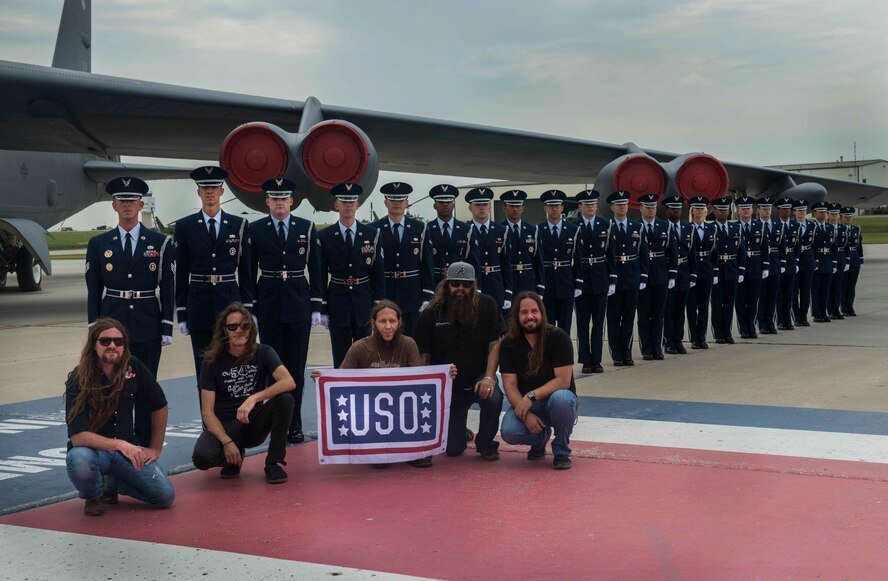 Blackberry Smoke band members pose with the Minot Air Force Base honor guard July 21, 2014. The band made a stop at Minot AFB as the first showing of their USO tour to pay tribute to the men and women who serve. (U.S. Air Force photos/Airman 1st Class Lauren Pitts)  