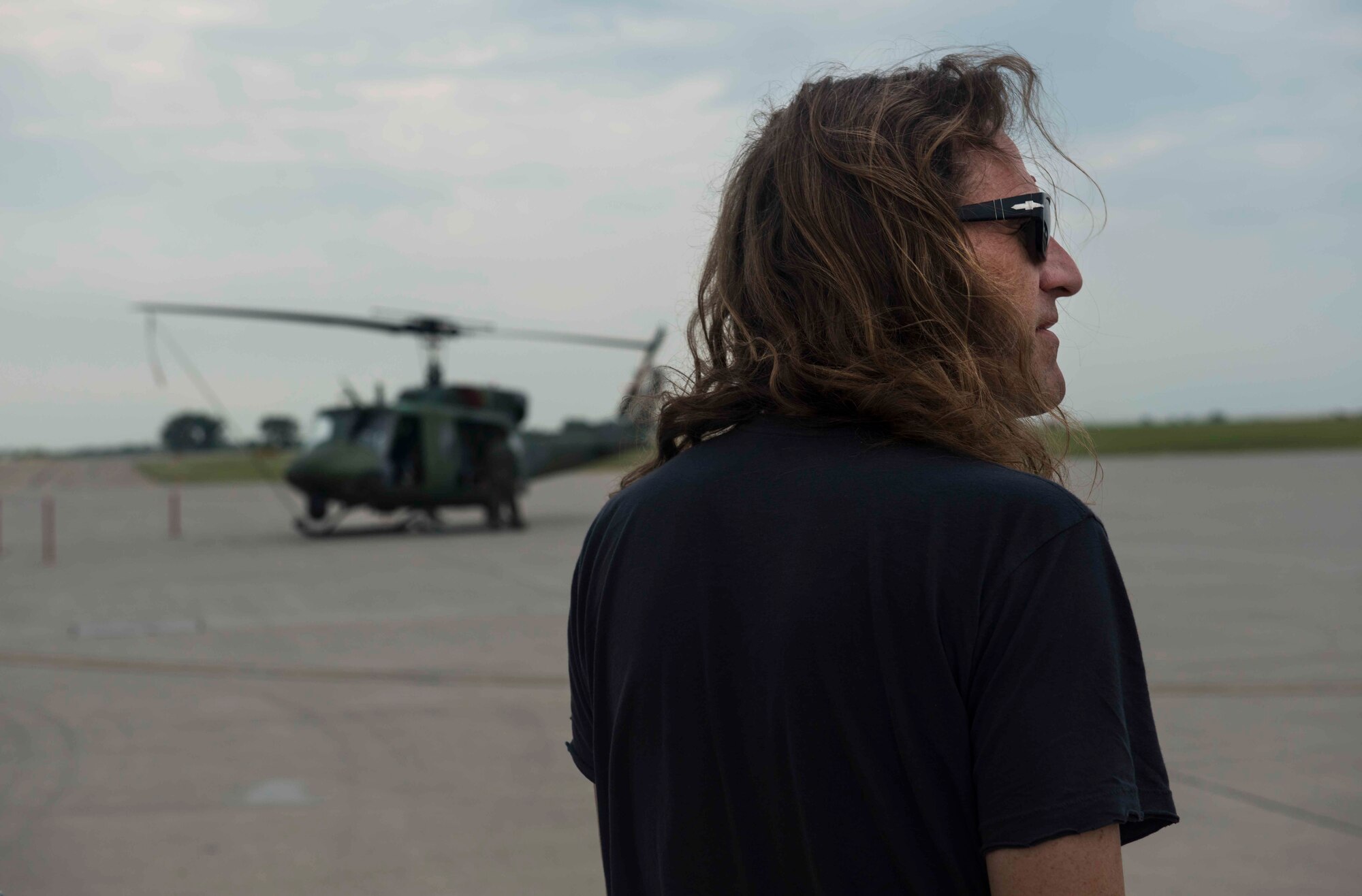 Blackberry Smoke bass guitarist, Richard Turner tours the flightline at Minot Air Force Base, N.D., July 21, 2014. Due to their personal military connections, the band wanted to participate in the USO tour to pay tribute to the men and women who serve. (U.S. Air Force photos/Airman 1st Class Lauren Pitts)  