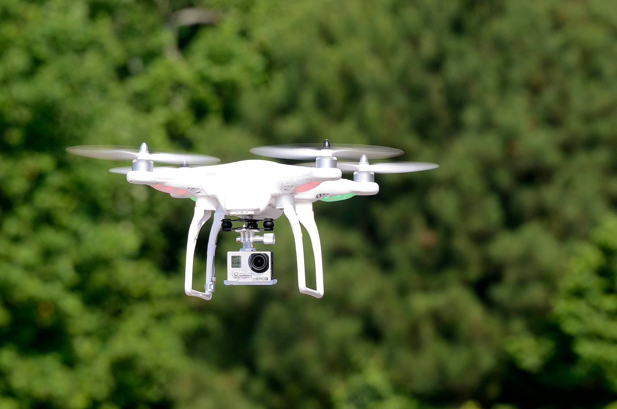 The Phantom 2 quad copter with an attached Go Pro Hero 3 video camera captures video and still photo imagery in a demonstration at the Air Force Reserve Command Transportation Proficiency Center, Dobbins Air Reserve Base, Ga., July 8, 2014. (U.S. Air Force photo/Don Peek)