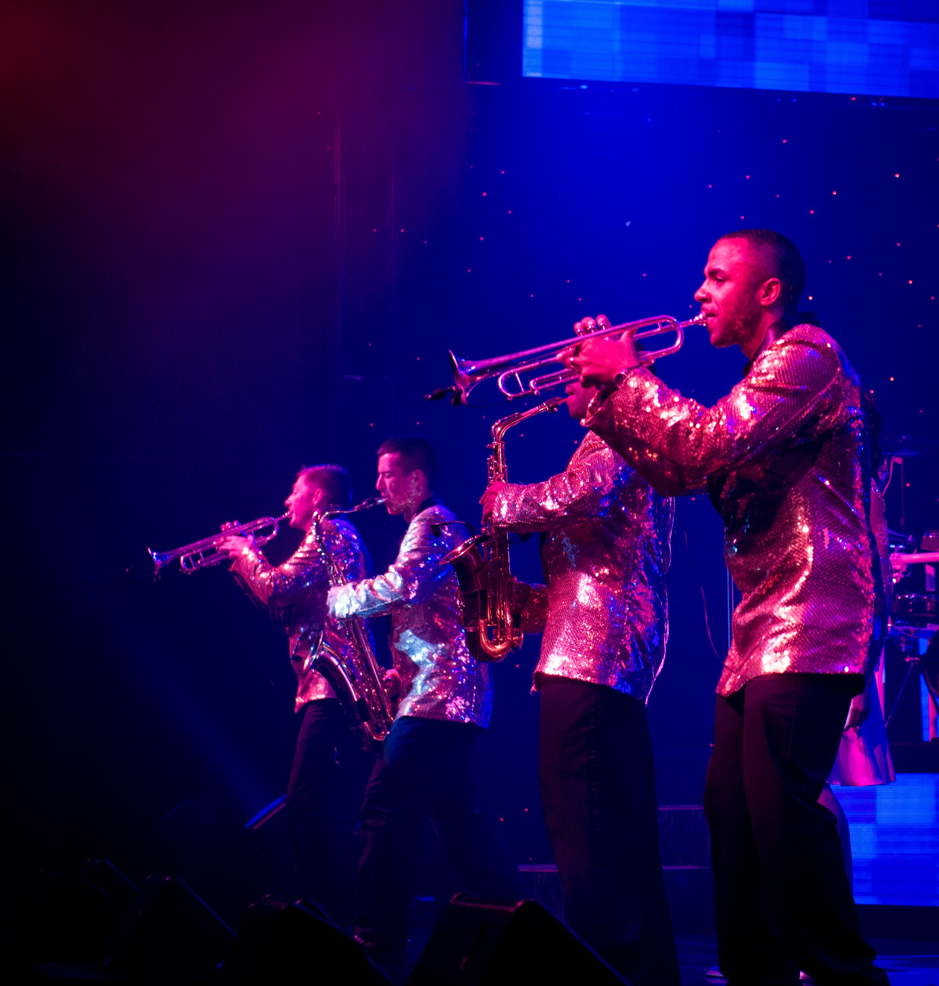 Musicians of Tops in Blue take center stage at the Taiyo Community Center at Yokota Air Base, Japan, July 22, 2014. Tops in Blue celebrates their 60th anniversary this year. (U.S. Air Force photo by Airman 1st Class Meagan Schutter/Released)