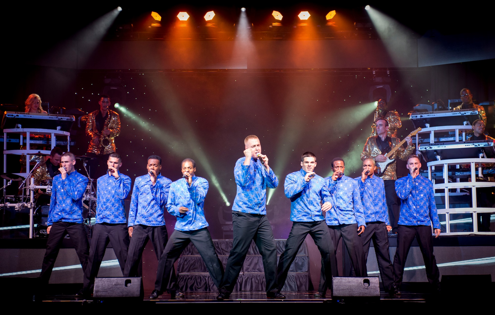Members of Tops in Blue perform at the Taiyo Community Center at Yokota Air Base, Japan, July 22, 2014. They performed a variety of songs from different genres throughout the show. (U.S. Air Force photo by Airman 1st Class Meagan Schutter/Released)