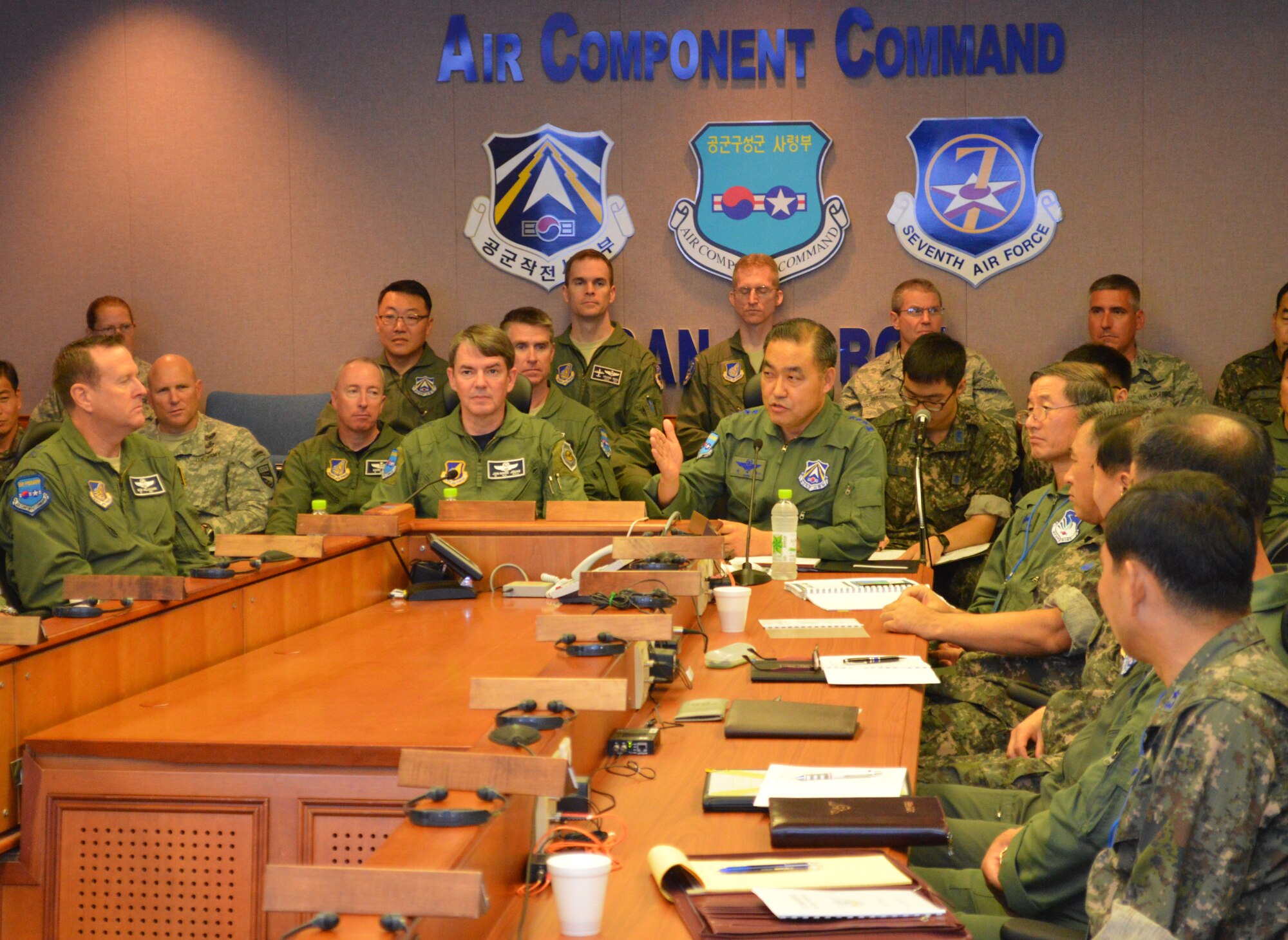 OSAN AIR BASE, Republic of Korea - Air Force Lt. Gen. Jan-Marc Jouas, 7th
Air Force and Combined Forces Command Air Component Commander, and Republic
of Korea Air Force Lt. Gen. Park, Jae Bok, Air Force Operations Command
Commander, offer opening remarks at the start of the annual 7th Air Force
Air Boss Conference on July 18, 2014. The conference brought together ROKAF
wing commanders and U.S. air wing commanders from every military branch
across the Pacific to receive briefings on the threat posed by north Korea
and how the Korea Airpower Team would conduct an air campaign in defense of
the Republic of Korea.  Jouas' comments reflected the importance of
individual and unit readiness to respond to an attack on the ROK, saying
"What's crucial is that you walk away from today's briefings understanding
your part in the plan. We know north Korean capabilities have evolved, and
we must be ready to respond to them." (U.S. Air Force photo by Tech. Sgt.
Thomas J. Doscher)
