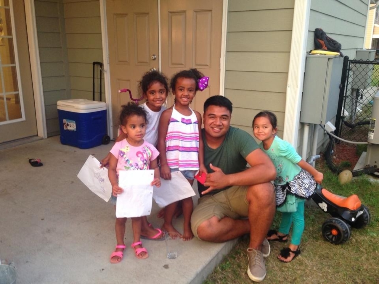 Army Pfc. Paul Ieti poses with some of his “little fans” on Hunter Army Airfield, Ga., after his performance on the NBC program “America’s Got Talent.” He credits a strong family bond, faith and his friends with keeping him grounded as his singing career rises. Courtesy photo