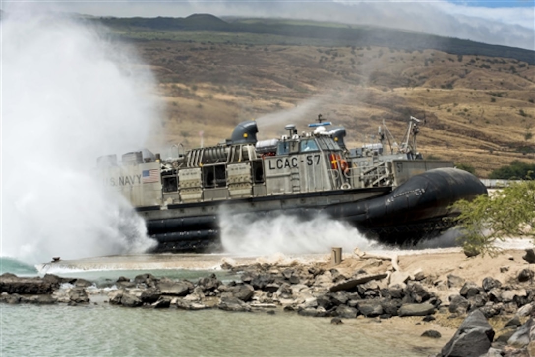 A landing craft air cushion arrives at Kawaihae Harbor, Hawaii, July 17, 2014, during Rim of the Pacific 2014. Twenty-two nations, more than 40 ships and submarines, more than 200 aircraft and 25,000 personnel are participating in the world's largest international maritime exercise. The event provides training to help participants foster the cooperative relationships critical to ensuring the safety of sea lanes and security on the world's oceans. 