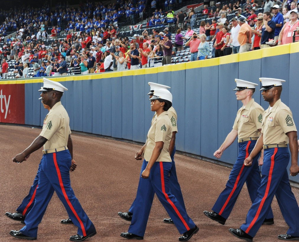 More than 60 Marines march onto Turner Field in Atlanta, Georgia, during the Atlanta Braves’ Marine Corps Appreciation Day game, July 19.