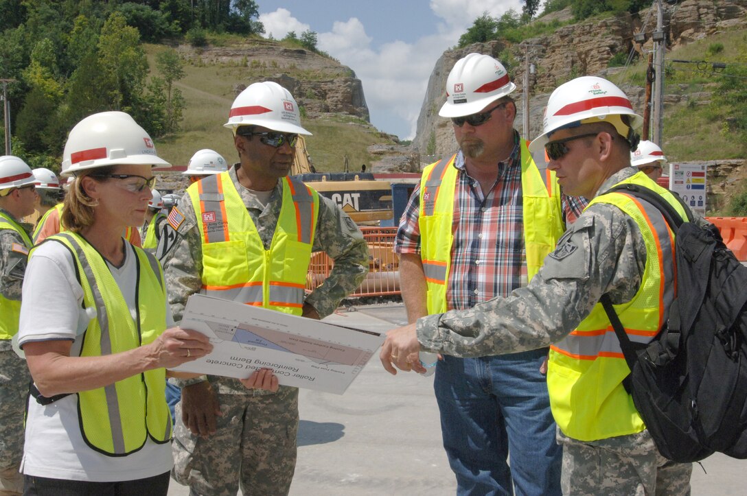 Lt. Col. John L. Hudson (Right), U.S. Army Corps of Engineers Nashville District commander; Bill DeBruyn (Second from Right), resident engineer; Linda Adcock, project manager; update Lt. Gen. Thomas Bostick, USACE commander and chief engineer, on the Center Hill Dam Seepage Rehabilitation Project during a tour of the project in Lancaster, Tenn., July 22, 2014. (USACE photo by Leon Roberts)