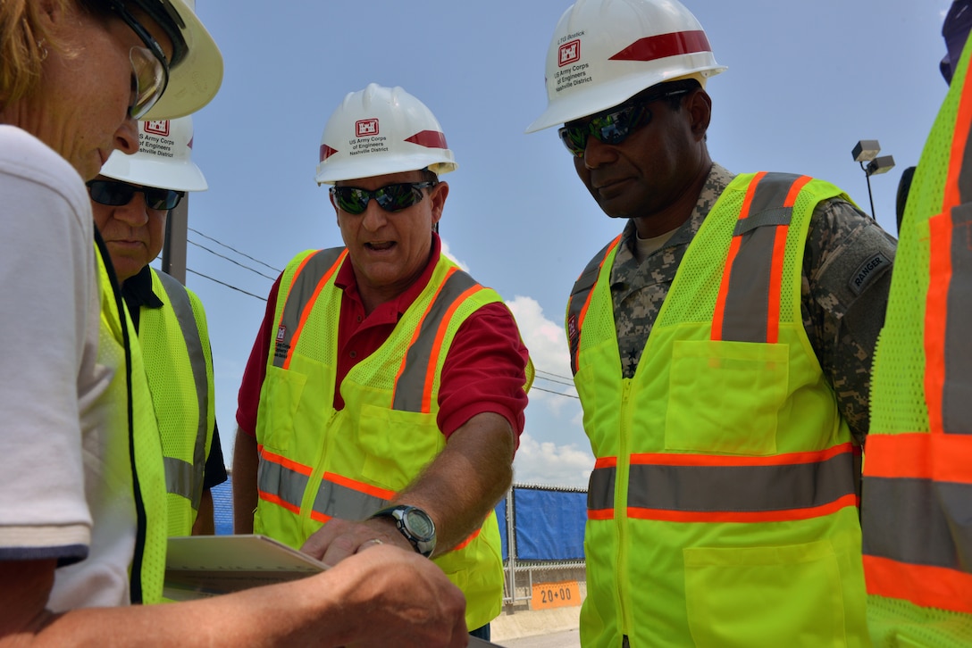 U.S. Army Corps of Engineers Nashville District, Engineering and Construction Chief, Jimmy Waddle talks with Lt. Gen. Thomas P. Bostick, the Army's chief of engineers and USACE commanding general during a visit to the Center Hill Dam project July 24, 2014 in Lancaster, Tenn. 