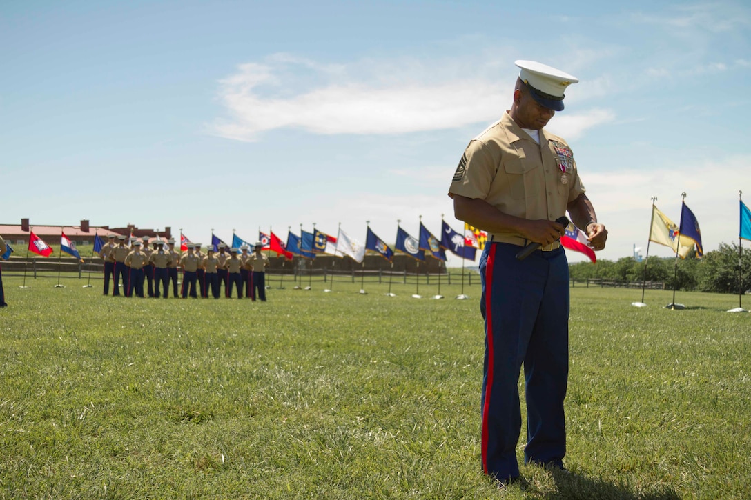 U.S. Marine Corps Master Gunnery Sgt. Richard W. Babb pauses while giving a speech during his retirement ceremony at Fort McHenry in Baltimore, Md., June 20, 2014. The Trinidad native enlisted in the Marine Corps on August 1, 1984 and following recruit training went on to become a combat engineer. Babb deployed to the Mediterranean, North Africa, Japan, the Republic of Korea, Thailand, the South China Sea and participated in Operations Desert Shield and Desert Storm. He was also assigned to the Marine Corps Research and Development and Acquisition Command at Quantico, VA as a test operator of prototypes in the Emerging Technology and Mine/Counter-mine Warfare Systems section. In 1995, Babb reported for recruiting duty in Washington D.C. and has worked within the Marine Corps Recruiting Command for the past 18 years, serving in various positions such as canvassing recruiter, sub-station commander, assistant recruiter instructor and recruiter instructor. In September 2008, Babb was assigned to be the recruiter instructor for RS Baltimore, which would be his final duty station. Babb’s dedication to his duties directly influenced RS Baltimore’s success, earning them recognition by the Commandant of the Marine Corps as one of the superior recruiting stations in the nation for the years of 2008, 2009, 2011, and 2013. (U.S. Marine Corps photo by Sgt. Bryan Nygaard/Released)