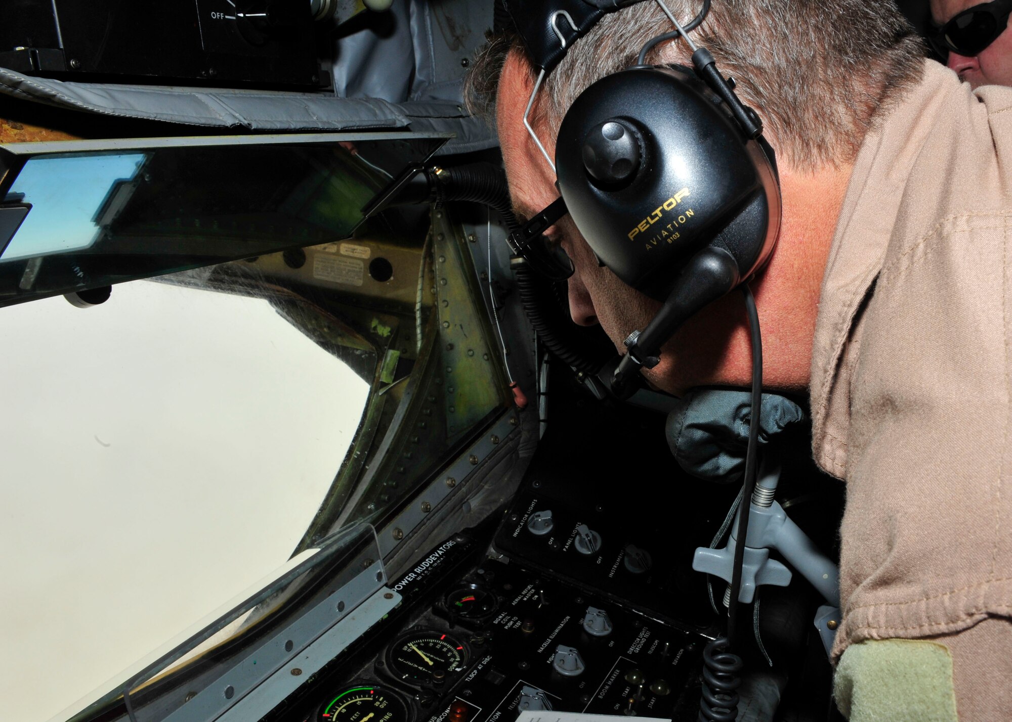 Senior Master Sgt. Floyd W. Atkins refuels a B-1B Lancer July 17, 2014, over Afghanistan. Aerial refueling extends the capabilities of any aircraft by expanding the range of the aircraft. Atkins is a 340th Expeditionary Air Refueling Squadron boom operator. (U.S. Air Force photo/Senior Airman Colin Cates)