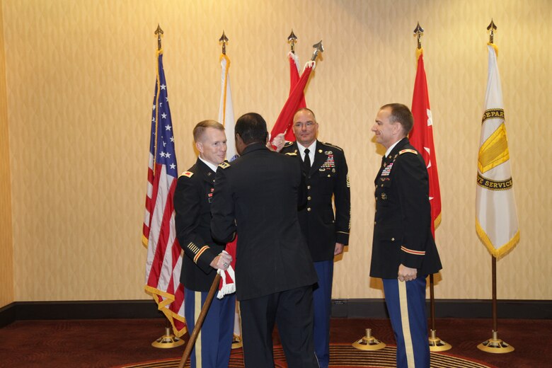 Col. David C. Hill is passed the colors from Lt. Gen. Thomas P. Bostick, commanding general of the U.S. Army Corps of Engineers, symbolizing the transfer of authority. (Photo by SWD photo)

