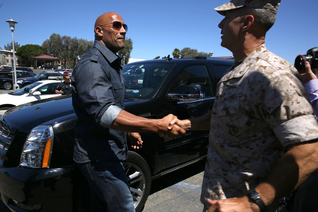 Actor Dwayne "The Rock" Johnson meets with Brig. Gen. John W. Bullard upon his arrival at the base theater July 24.

Johnson visited Camp Pendleton for a screening of his new movie "Hercules" and to conduct a meet and greet with fans.