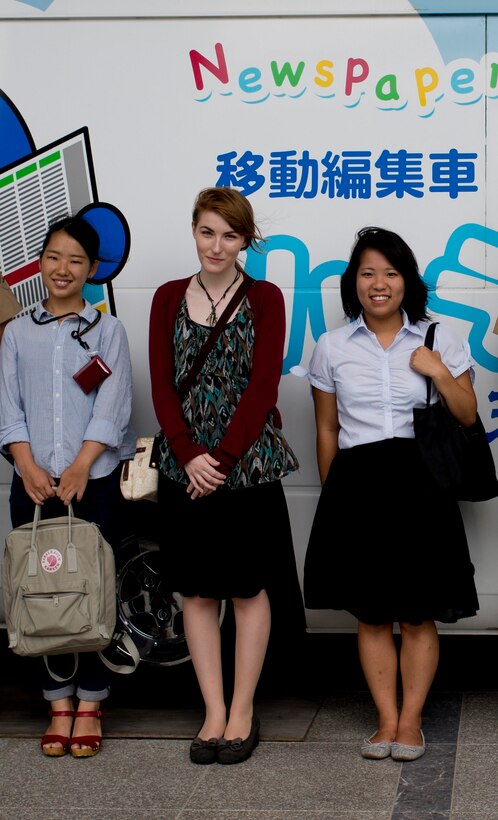 From left to right, Nanase Mori, Deirdre M. Erkman and Teiko Yoshida pose for a photo in front of the Ryukyu Shimpo Newspaper Museum July 24 in Naha, Okinawa. They spent the day learning about the history of the Ryukyu Shimpo newspaper and its production. Mori, Erkman, and Yoshida are interns with the G-7, government and external affairs office, Marine Corps Installations Pacific-Marine Corps Base Camp Butler, to learn about the different aspects of the Marine Corps’ role on Okinawa. Erkman is a senior at Tulane University, New Orleans, Louisiana. Mori is a senior at International Christian University, Tokyo, Japan. Yoshida is a senior at Senshu University, Tokyo, Japan. (U.S. Marine Corps photo by Lance Cpl. Brittany A. James/Released)
