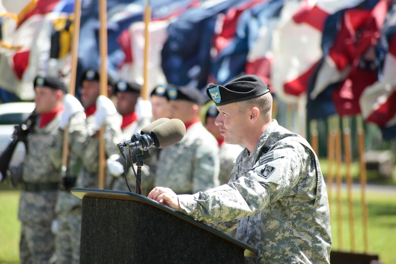 Col. Jeffrey L. Milhorn delivers remarks at the UlS. ArmyCorps of Engineers-Pacific Ocean Division Change-of-Command ceremony, July 18, 2014, Fort Shafter, Hawaii. Milhorn became the 31st commander of the Army Corps' division serving the Asia-Pacific region.