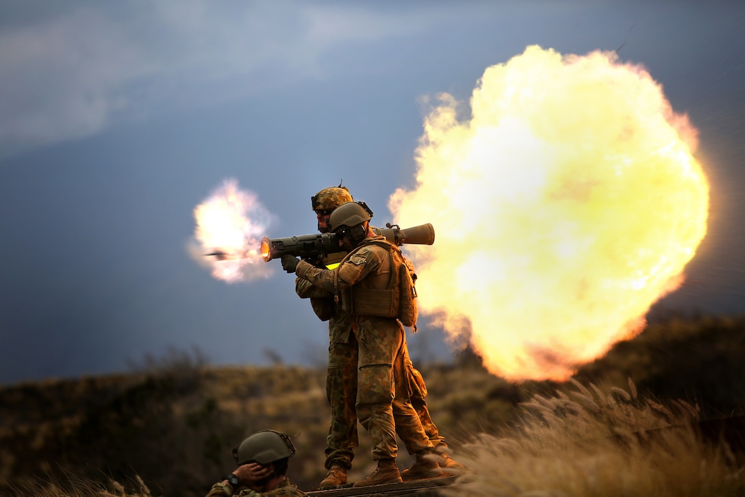 POHAKULOA TRAINING AREA, Hawaii - Australian soldiers assigned to 5th Royal Australian Regiment fire an 84 mm M3 Carl Gustave rocket launcher at Range 10, Pohakuloa Training Area, Hawaii, July 20, during Rim of the Pacific (RIMPAC) Exercise 2014.Twenty-two nations, more than 40 ships and submarines, about 200 aircraft and 25,000 personnel are participating in RIMPAC from June 26 to Aug. 1 in and around the Hawaiian Islands and Southern California. The world's largest international maritime exercise, RIMPAC provides a unique training opportunity that helps participants foster and sustain the cooperative relationships that are critical to ensuring the safety of sea lanes and security on the world's oceans. RIMPAC 2014 is the 24th exercise in the series that began in 1971. (U.S. Marine Corps photo by Cpl. Matthew Callahan/Released)