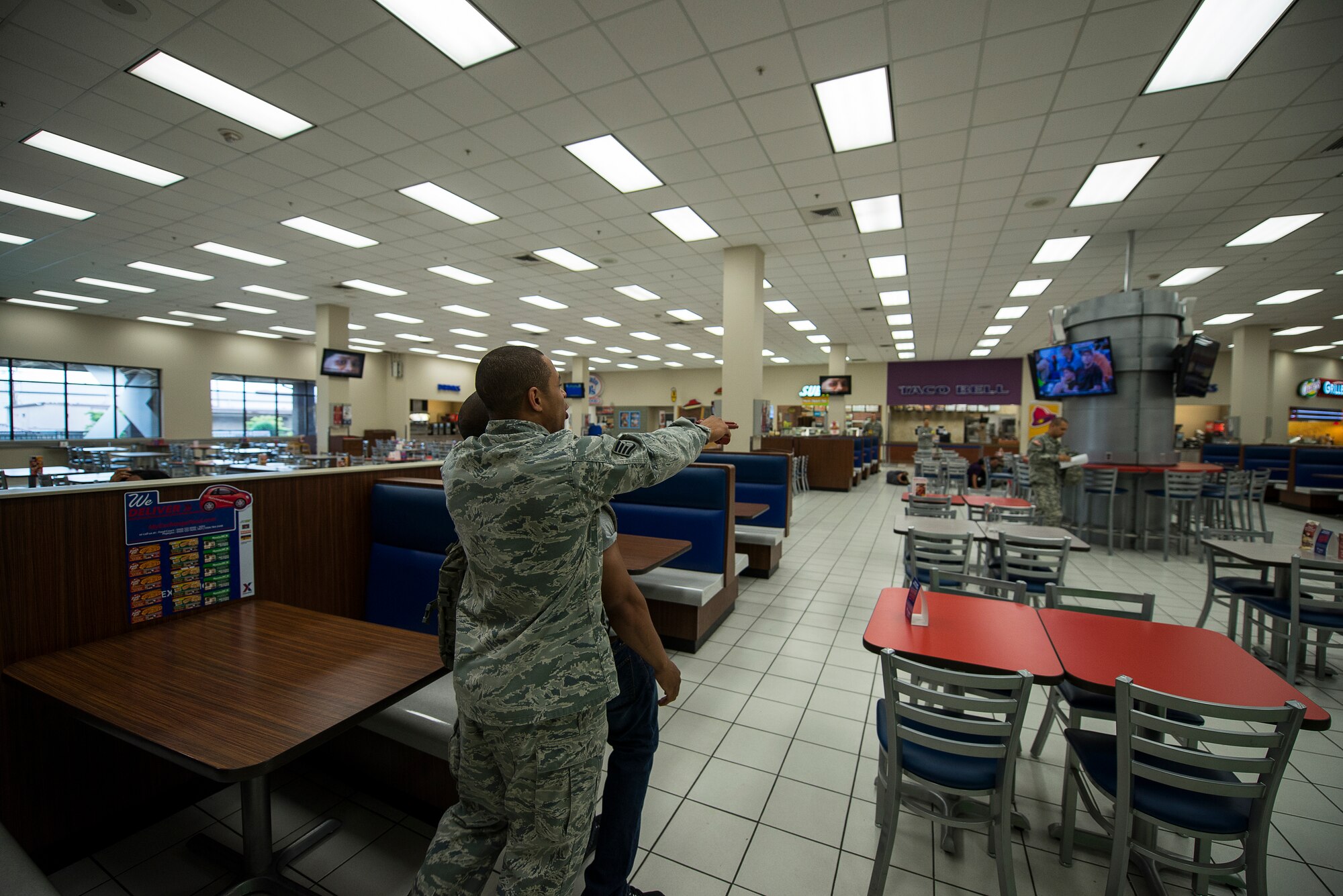 A simulated gunman holds a hostage during an active-shooter exercise July 24, 2014, at Osan Air Base, Republic of Korea. The exercise was designed to test the base's response abilities in the event of an active-shooter emergency. (U.S. Air Force photo by Staff Sgt. Jake Barreiro)