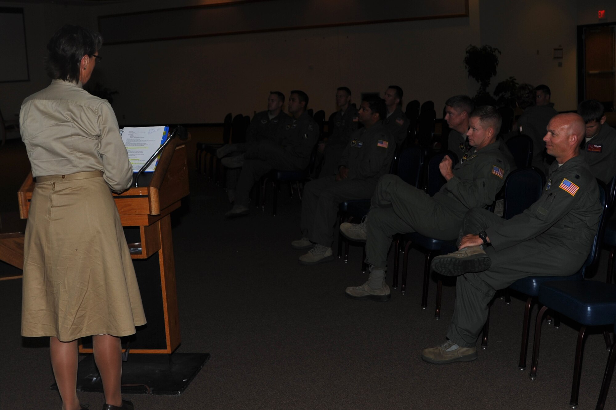 ALTUS AIR FORCE BASE, Okla. – Kay Nehring, World War II Airborne Demonstration Team Foundation deputy chief of staff, briefed Airmen of the 54th Air Refueling and 58th Airlift Squadrons with footage taken by her father, U.S. Army Air Forces Lt. Charles Nehring, C-47 Skytrain pilot, in the Freedom Community Center during the Airlift and Tanker Association tour July 23, 2014. Pairing the footage with the information she gathered from his letters and flight log, Nehring narrated several of the missions that her father flew during WWII. (U.S. Air Force photo by Airman 1st Class J. Zuriel Lee/Released)