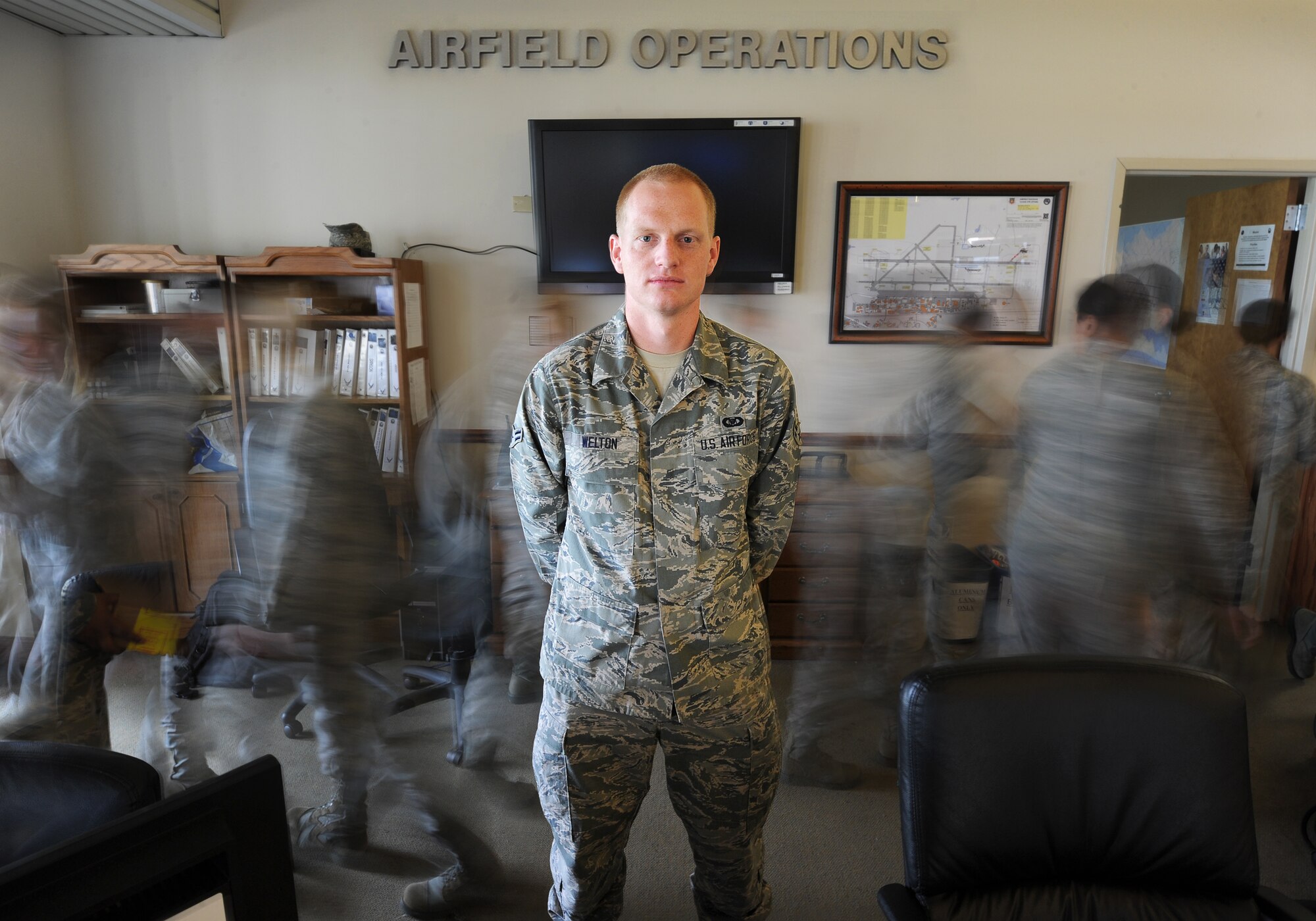 Airman 1st Class Stephen Welton, 325th Operations Support Squadron operations coordinator, poses for a photo Jun 19 at Base Operations. (U.S. Air Force photo illustration by Airman 1st Class Alex Echols)