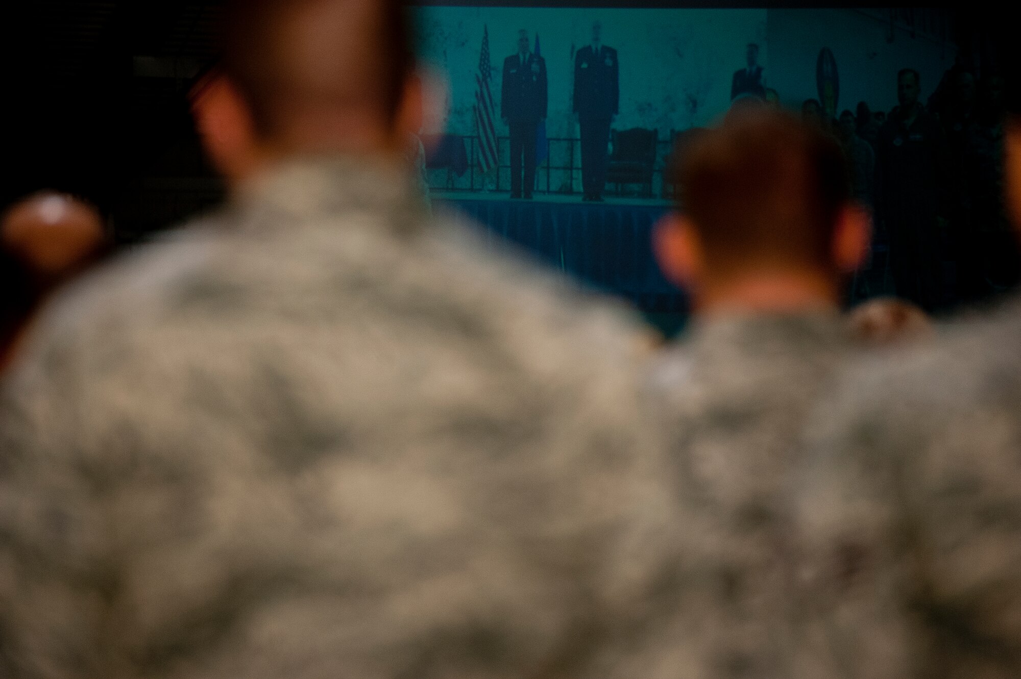 Airmen from the 621st Contingency Response Wing at Travis Air Force Base,
Calif., watch their Commander, Col. Martin A. Chapin, relinquish command to
Col. James A. Copher through a video teleconference during the 621 CRW
change of command at Joint Base McGuire-Dix-Lakehurst, N.J., July 24, 2014.
Copher previously served as the vice wing commander of the 380th Air Expeditionary
Wing in Southwest Asia.  (U.S. Air Force by Tech. Sgt. Matthew Hannen/Released )
