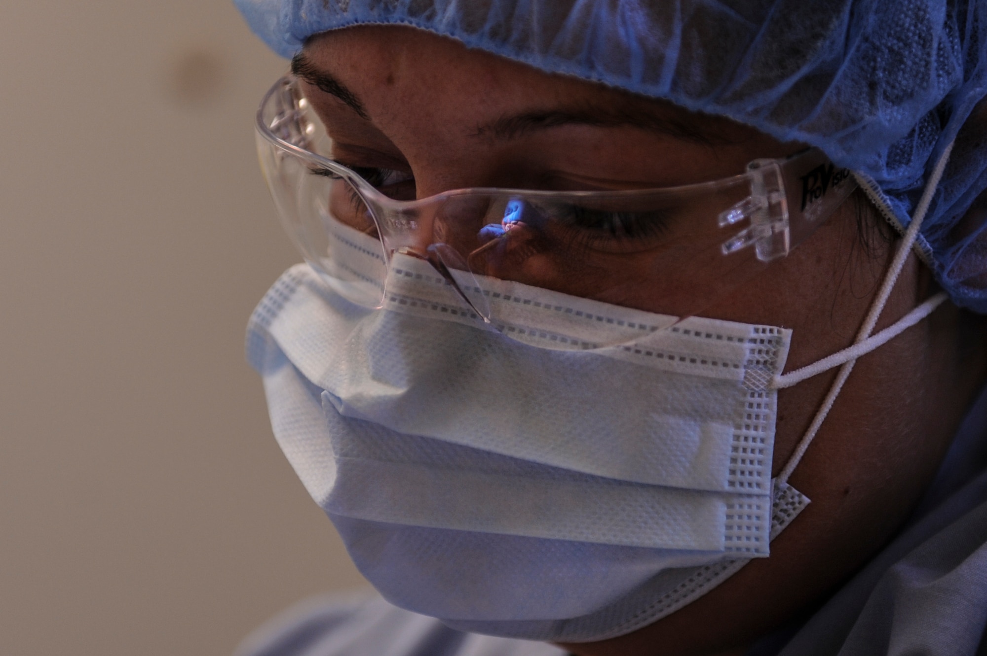 An Airman from the19th Medical Group dental clinic cleans, Airman 1st Class Jacob Burgener, a 53rd Airlift Squadron crew chief, teeth July 10, 2014, at Little Rock Air Force Base, Ark. The 19th MDG dental clinic provides responsive care and services to the base population and ensures a fit and medically ready active-duty force. (U.S. Air Force photo by Airman 1st Class Cliffton Dolezal)