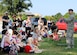 Staff Sgt. Christopher Rutkowski tells a crowd of Team Andrews members about the 11th Wing Security Support Squadron's Military Working Dog mission at the library at Joint Base Andrews, Md., July 23, 2014.  The library hosted the MWD demonstration as part of its "Paws to Read" summer reading program, which runs through Aug. 9.  Rutkowski is an 11th SSPTS MWD trainer. (U.S. Air Force photo/Staff Sgt. Torey Griffith)