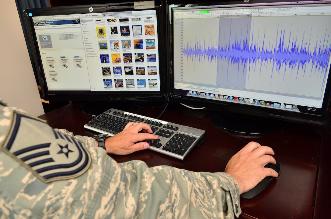 Band webmaster, Master Sgt. Brian Davis, creates a ringtone from the Airmen
of Note album Let's Dance.  He creatively cuts the tracks down and converts
them into 10 to 30 second tones for Android and iPhone devices. (U.S. Air
Force photo by Senior Master. Sgt Robert Kamholz/released)