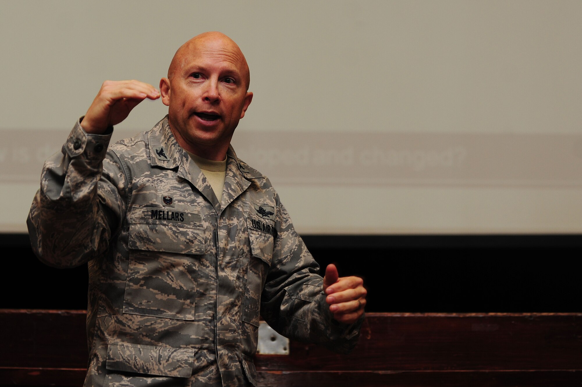 Col. Douglas Mellars, 422nd Air Base Group commander, speaks with Airmen about changing the leadership culture at RAF Croughton, United Kingdom, July 22, 2014. Several minutes into the commander’s call, Mellars was interrupted by a lone gunman enacting an active-shooter exercise. (U.S. Air Force photo by Staff Sgt. Jarad A. Denton/Released)