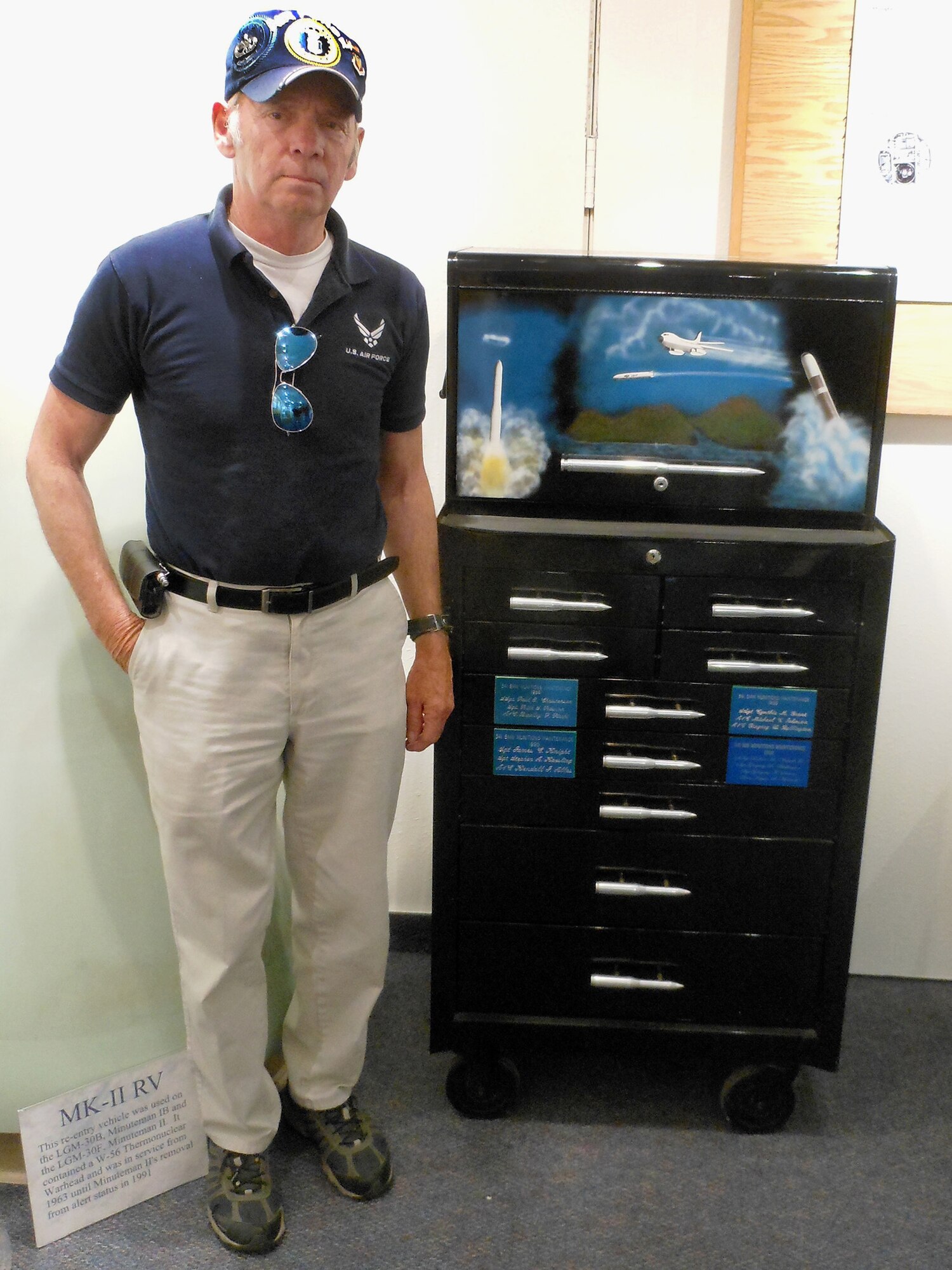 Donald Jones poses July 1, 2014 with the toolbox he painted in 1986 for the 341st Strategic Missile Wing munitions maintenance team to use in the Olympic Arena competition at Vandenberg AFB, Calif.  Jones was a master sergeant assigned to Malmstrom AFB, Mont., when he customized the toolbox. The item is currently on display at the Malmstrom museum. (U.S. Air Force photo/Curt Shannon)