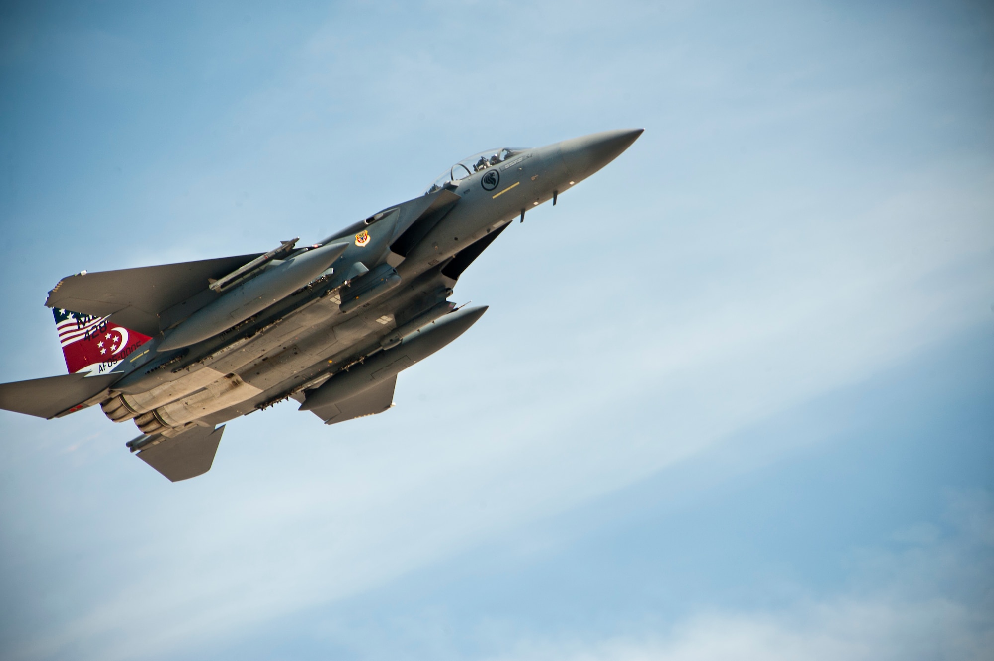 Republic of Singapore air force’s 428th Fighter Squadron’s flagship F-15SG aircraft assigned to the 366th Fighter Wing Mountain Home Air Force Base, Idaho, takes off for a Red Flag 14-3 training mission, July 18, 2014 at Nellis AFB, Nev. The 428th FS aircrews and support members are participating in their first Red Flag at Nellis AFB.  The 428th FS "Buccaneers" is the U.S. flagged flying squadron of the Peace Carvin V program, a long-term partnership with the Republic of Singapore. The squadron is dedicated to the training of Singaporean aircrew in the F-15SG, the country's newest fighter platform. The combined efforts of this program help ensure a strong U.S. relationship with Singapore, a critical partner in the region, while helping Singapore project airpower into the next generation. (U.S. Air Force photo by Lawrence Crespo)

