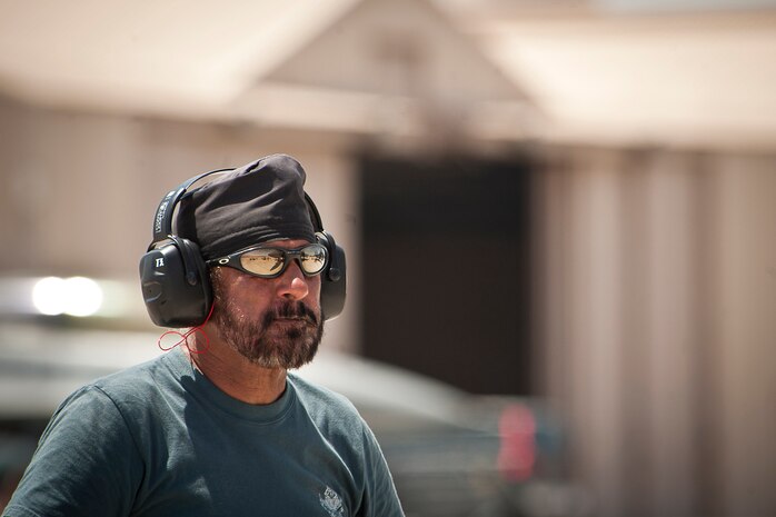 Republic of Singapore air force flightline production supervisor assigned to the 366th Fighter Wing, 428th Fighter Squadron, Mountain Home Air Force Base, Idaho, oversees the launch of the F-15SG aircraft during Red Flag 14-3, July 18, 2014 at Nellis AFB, Nev.  Red Flag provides an opportunity for the 428th FS aircrew and maintainers to enhance their tactical operational skills alongside military aircraft from coalition forces. (U.S. Air Force photo by Lawrence Crespo)