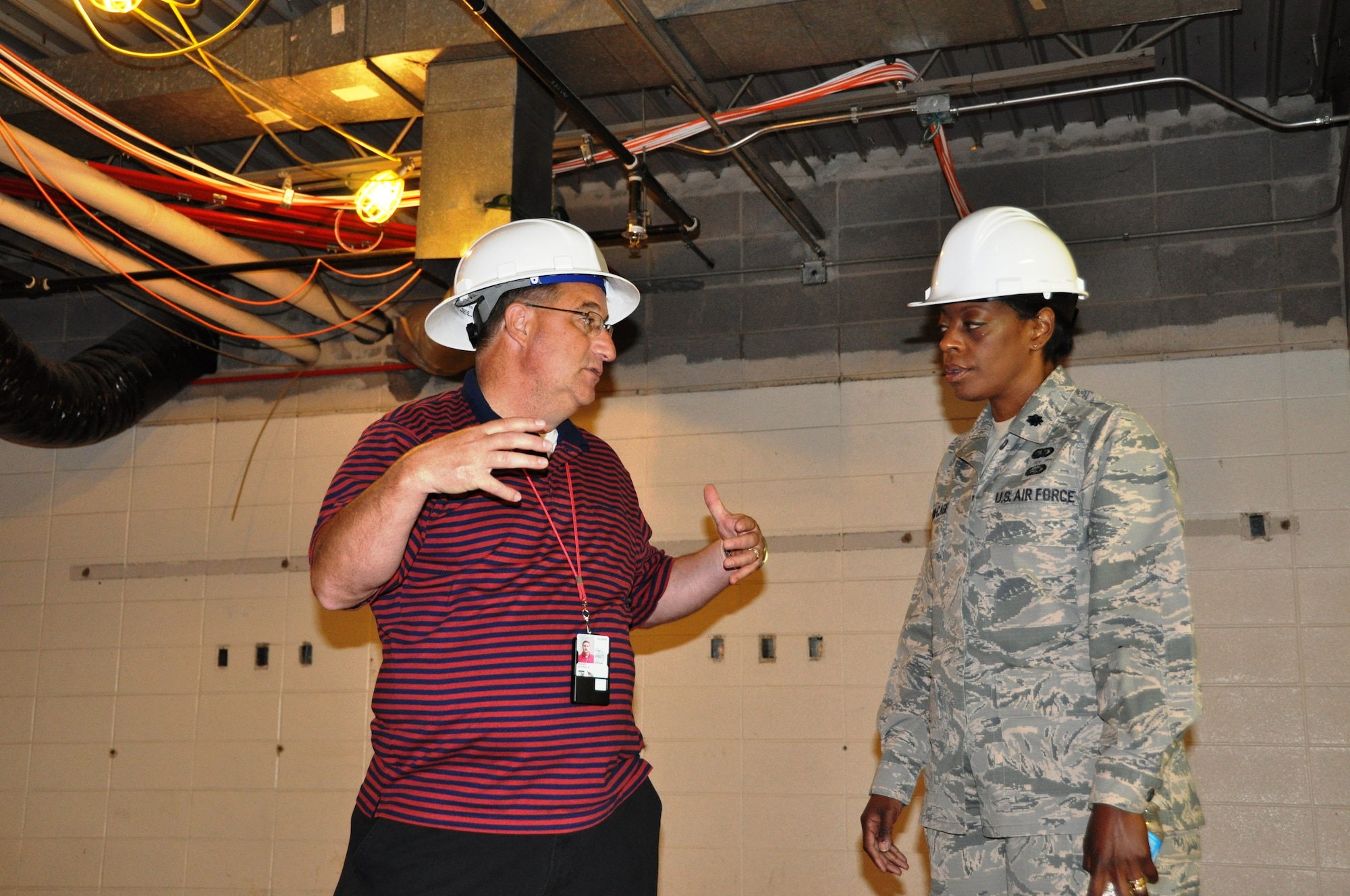 442d Fighter Wing senior leaders view progress being made in hangar 52 on Whiteman AFB, Mo.  The newly renovated offices will provide much needed space for several units across the wing. (U.S. Air Force photos by 1st Lt Jeff Kelly)