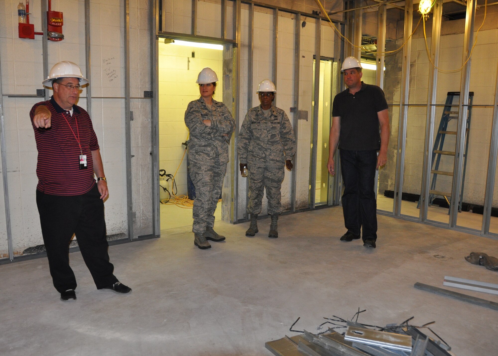 442d Fighter Wing senior leaders view progress being made in hangar 52 on Whiteman AFB, Mo.  The newly renovated offices will provide much needed space for several units across the wing. (U.S. Air Force photos by 1st Lt Jeff Kelly)