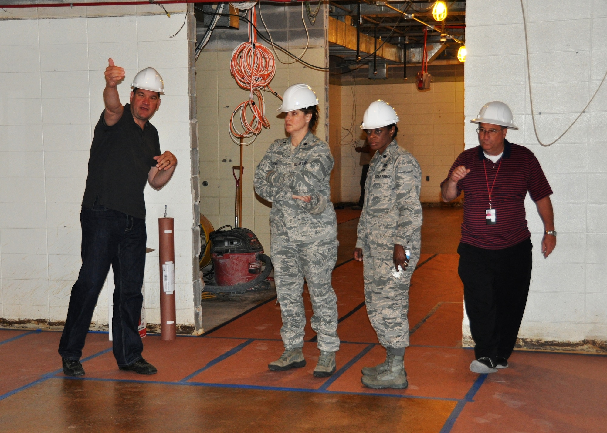 442d Fighter Wing senior leaders view progress being made in hangar 52 on Whiteman AFB, Mo.  The newly renovated offices will provide much needed space for several units across the wing. (U.S. Air Force photos by 1st Lt Jeff Kelly)