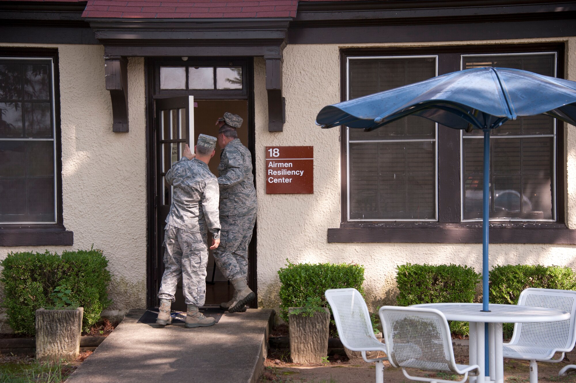 Chaplain (Maj.) Travis Yelton, left, 42nd Air Base Wing chaplain, escorts Chaplain (Col.) Steven Schaick, right, Command Chaplain of Air Education and Training Command, to the Airmen Resiliency Center at Maxwell Air Force Base, July 23, 2014. Schaick toured the center, and learned of its operations, which help Airmen gain resilience. (U.S. Air Force photo by Staff Sgt. Natasha Stannard)