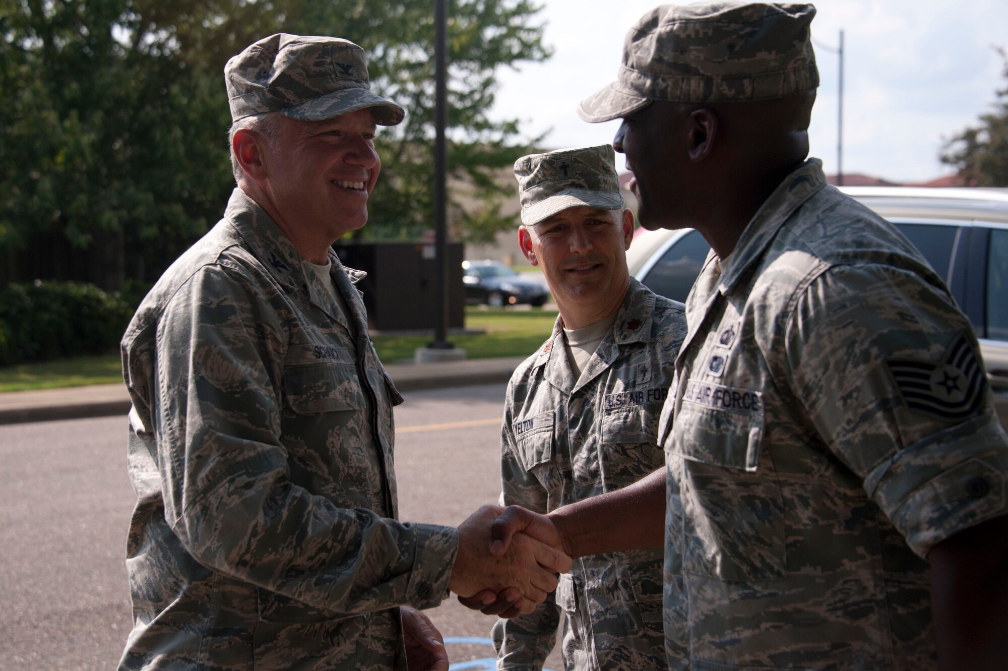 Chaplain (Col.) Steven Schaick, left, Command Chaplain of Air Education and Training Command, meets with Chaplain (Maj.) Travis Yelton, center, 42nd Air Base Wing chaplain, and Tech. Sgt. Clarence Shuford, 42nd Air Base Wing NCO in charge of chapel operations, at the Maxwell Air Force Base Airmen Resiliency Center, July 23, 2014. Schaick toured the newly opened center and learned about how it provides Airmen a social outlet to strengthen resilience. (U.S. Air Force photo by Staff Sgt. Natasha Stannard)