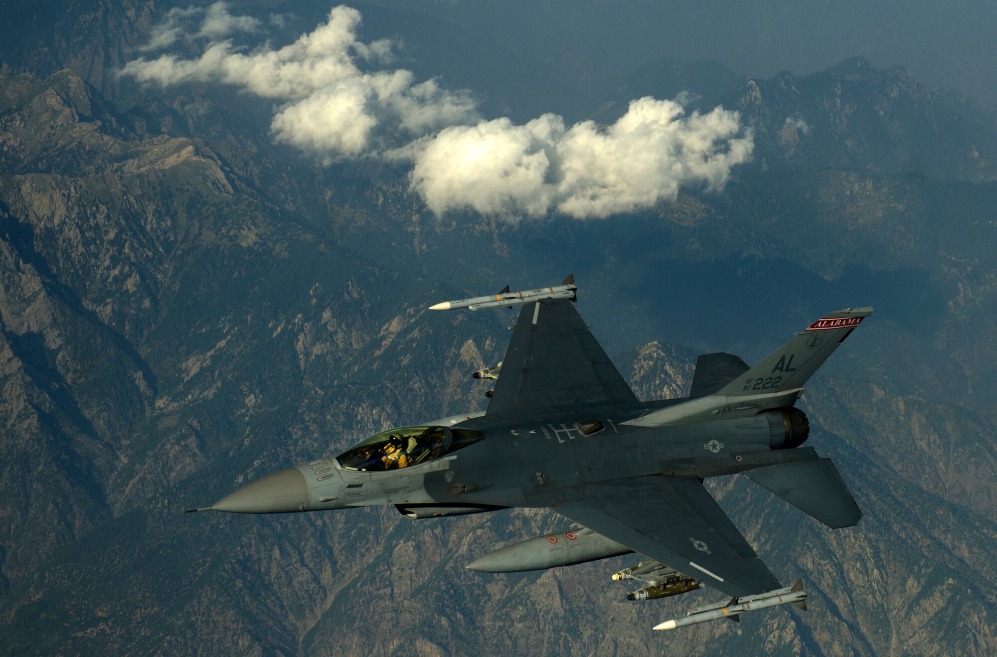 An F-16C Fighting Falcon flies over Afghanistan after an in-air refueling mission in support of Operation Enduring Freedom, July 22, 2014. The F-16 Fighting Falcon is a compact, multi-role fighter aircraft. It is highly maneuverable and has proven itself in air-to-air combat and air-to-surface attack. It provides a high-performance weapon system for the United States and allied nations. (U.S. Air Force photo by Staff Sgt. Vernon Young Jr./Released)